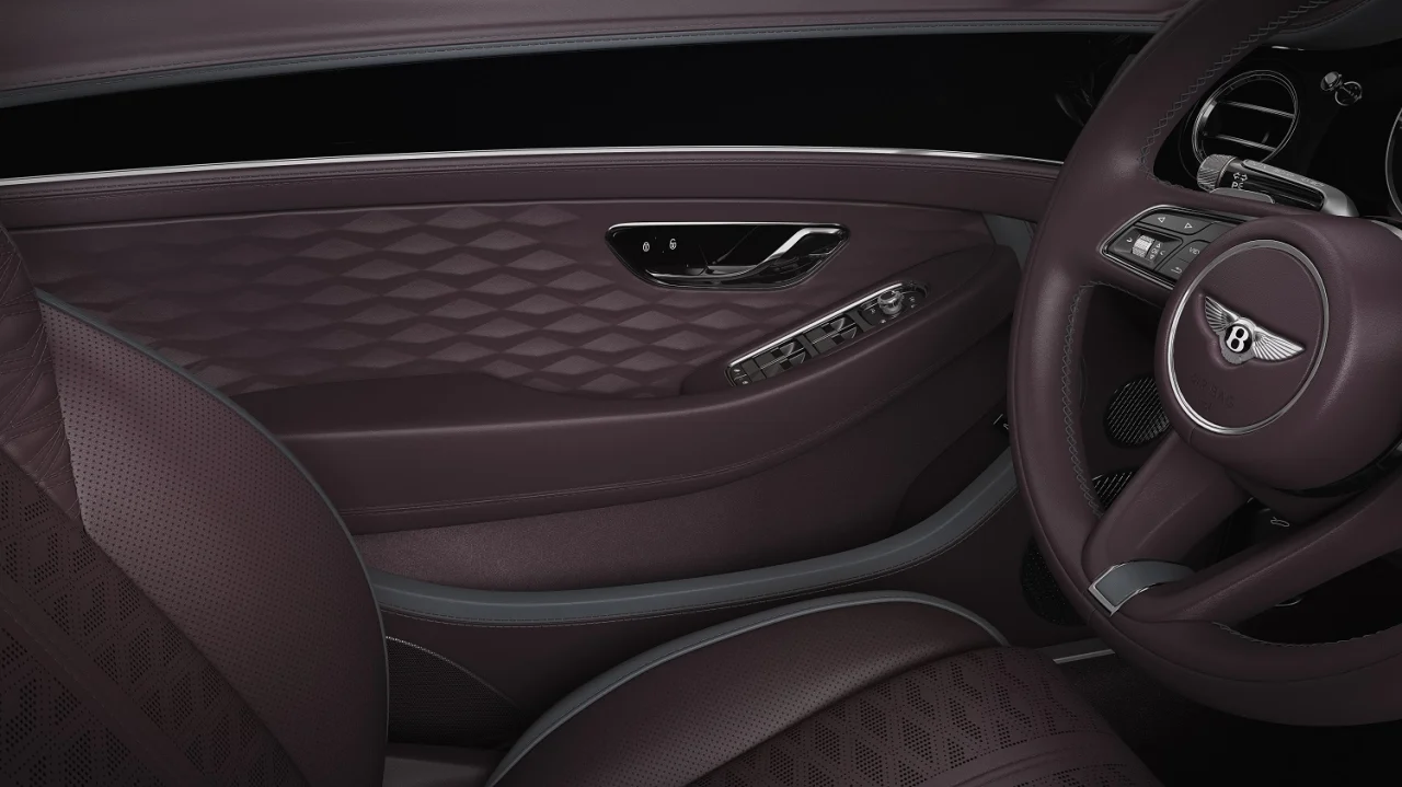 Bentley interior with a Damson Tweed door insert